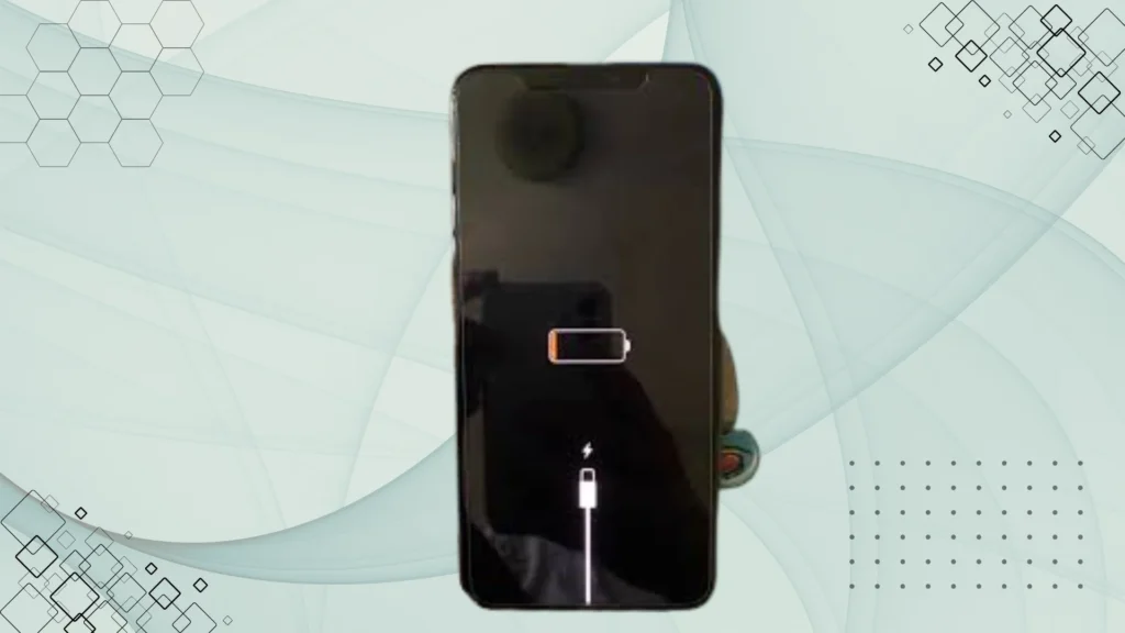 User holding an iPhone that suddenly turned off despite having battery left
